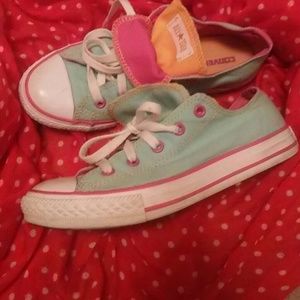 Pink and green Chucks.