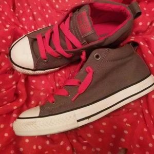 Grey and red Chucks.