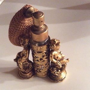 Old Globe perfume atomizer.  24 k gold plated.