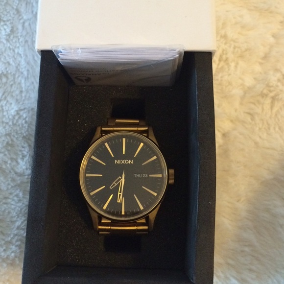 Gold Men's Nixon Watch