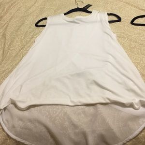 Cute white loose tank with fun back!