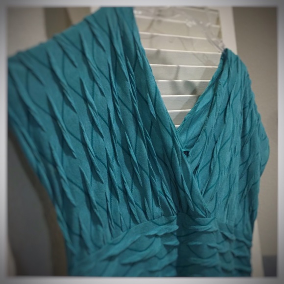 Teal deep neck plus size top.
