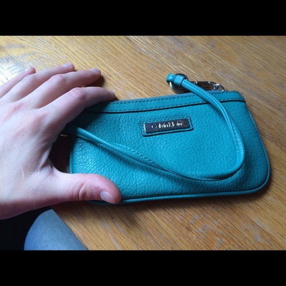 Turquoise Calvin Klein wristlet