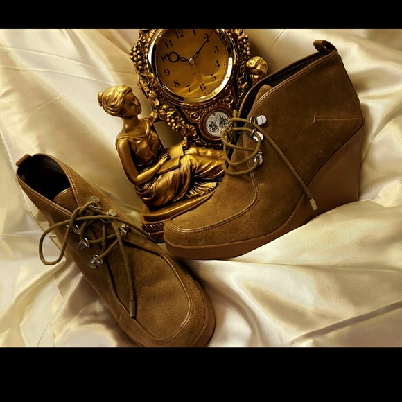 Calvin Klein Shoes - ONE DAY SALE !!!Calvin klien brown boots as new