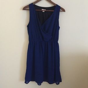 Blue and black drape front dress