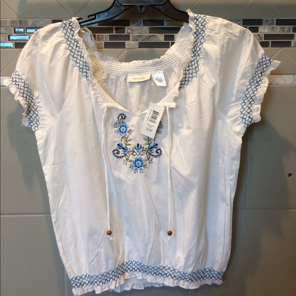 White top withembroidered design