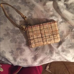 Gold Coach Wallet.
