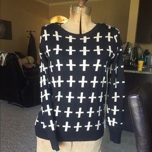 Cross sweater