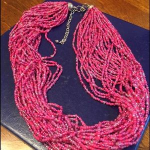 Multi stranded seed bead necklace  pink in color