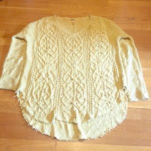 Free People cable knit long sleeve sweater.