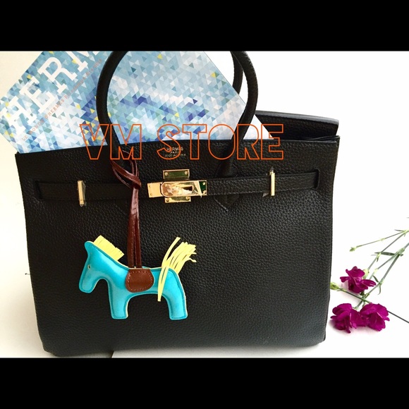 Limited time Only $20, Blue Rodeo bag charm, New.