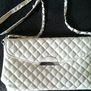 Ivory colored purse with half chain strap