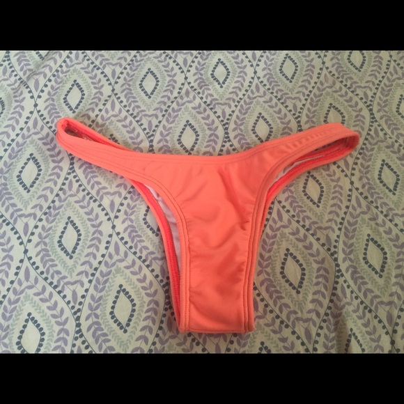 Coral color, cheeky/thong bikini bottom