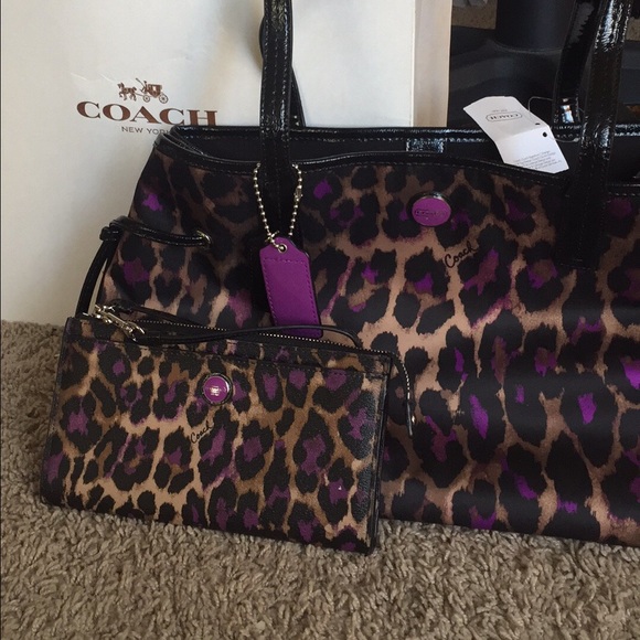 REDUCED- Coach ocelot print carryall with wristlet