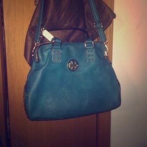 Turquoise with gold accent cross body bag