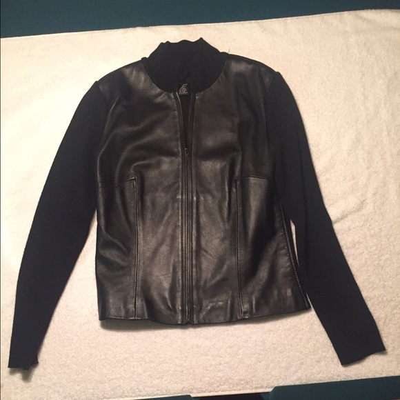 Black zip-up sweater with leather print