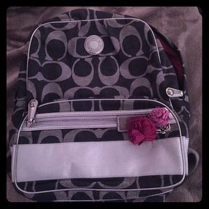 Navy blue and silver coach backpack