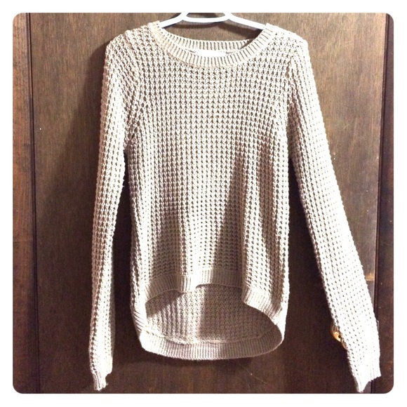 Ambiance. Tan sweater.