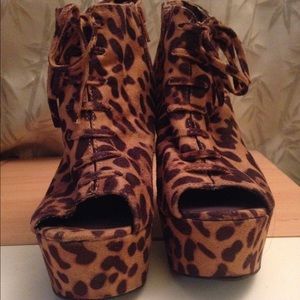 Cheetah print peep toe wedges