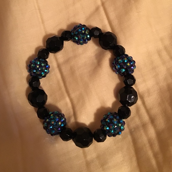 Black bracelet with blue beads