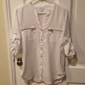 White elegant blouse with gold accents