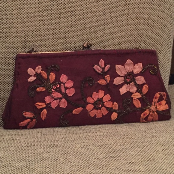 Embroidered burgundy and dark peach clutch
