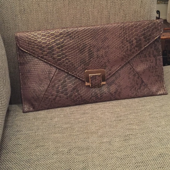 Urban Expression - brown snaked skin clutch