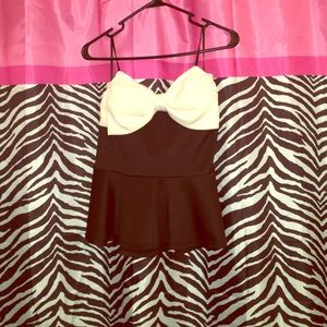 Cream and black peplum top