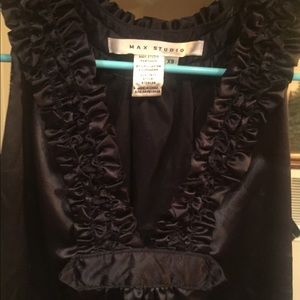 A silky soft black top with detailed front.