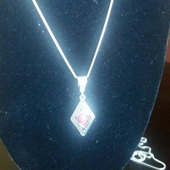 Sterling silver red Tibetan charm on chain