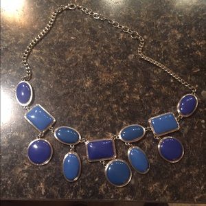 Silver necklace with blue gems