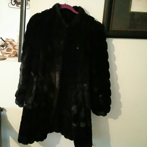 Gorgeous faux mink coat. Worn 1 time