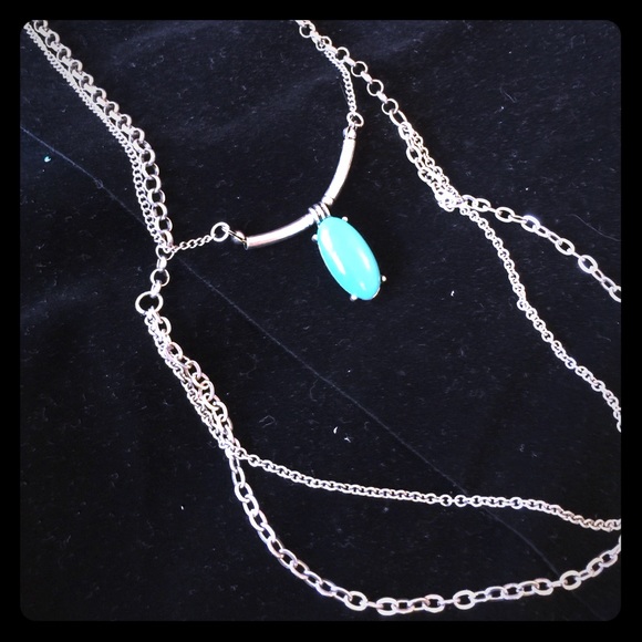 Necklace silver with faux turquoise stone.