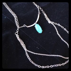 Necklace silver with faux turquoise stone.
