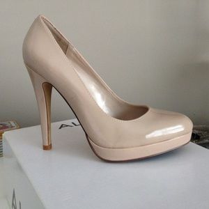 Brand new nude patent pump heels