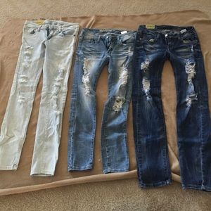 Machine--distressed jeans