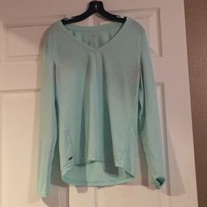 Danskin Now Mint colored shirt.