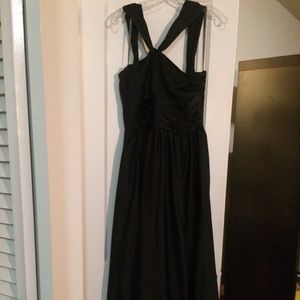 Black long Monique Lhullier bridesmaids dress.