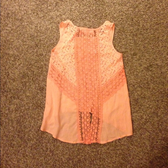 Peach colored high-low crop top