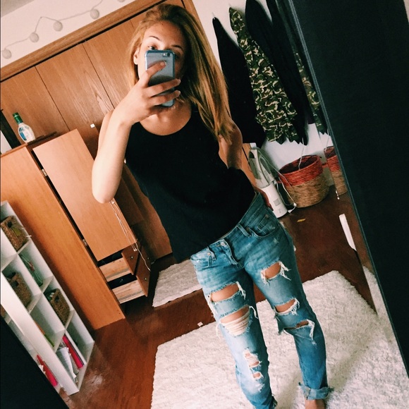 Loose fitting black light weight tank top.
