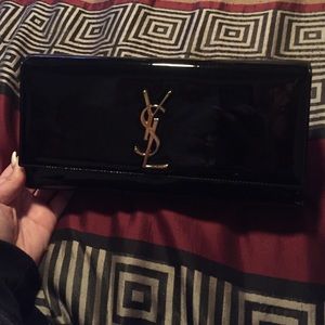 Authentic black patent leather YSL clutch.AS IS