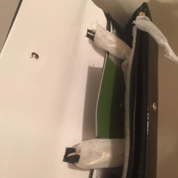 Brand new Kate spade faux furs wallet