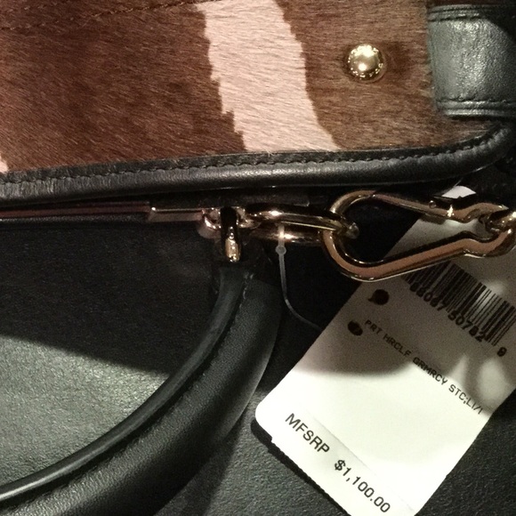 Coach hair calf satchel with dust bag.
