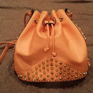 Studded bucket bag