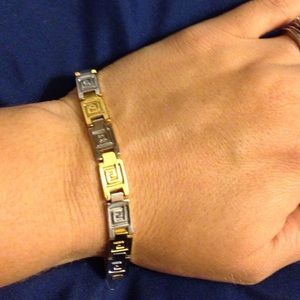 Silver and gold toned bracelet