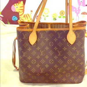 Louis Vuitton neverfull mm bag.