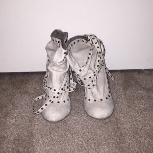 Ruby cream slouched short heeled booties.