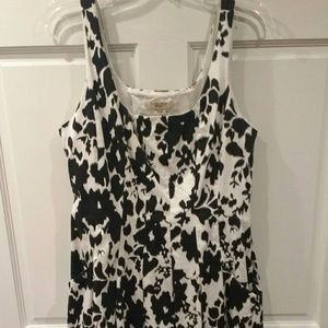 Size 12 black and white short dress with pockets.