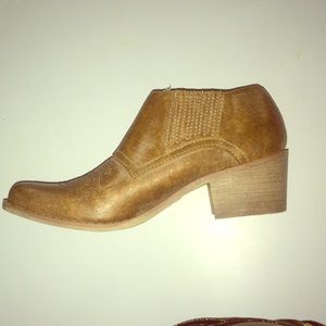 Brand new Ankle boots.Run True To Size. 6.5