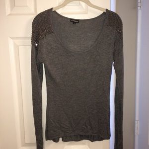 Gray sweater with shoulder spikes